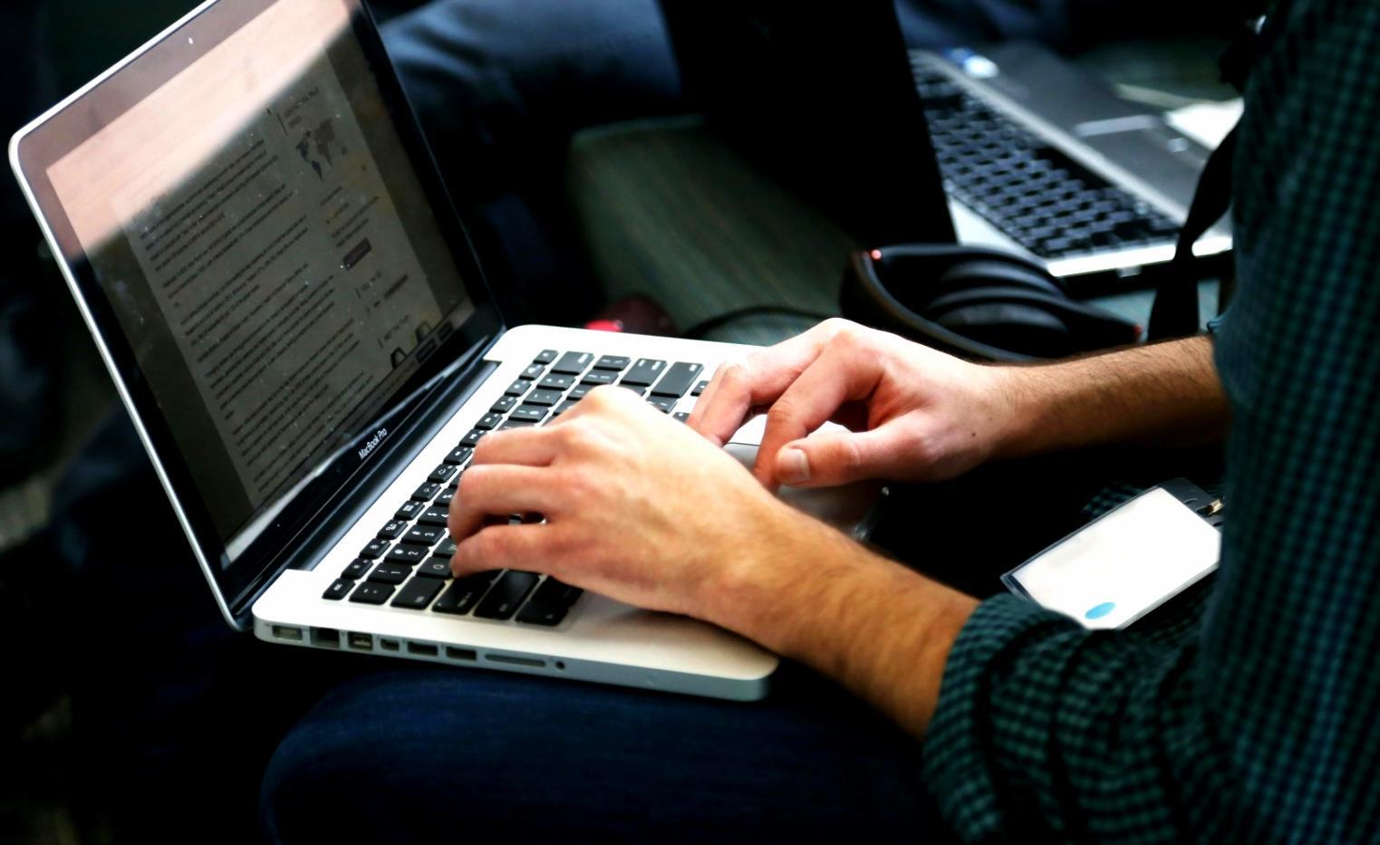 Modern office workspace with invoice processing systems